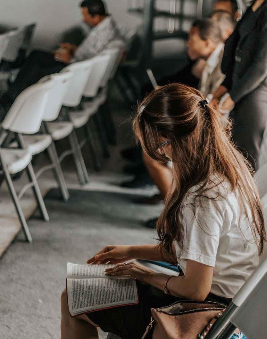 woman holding book
